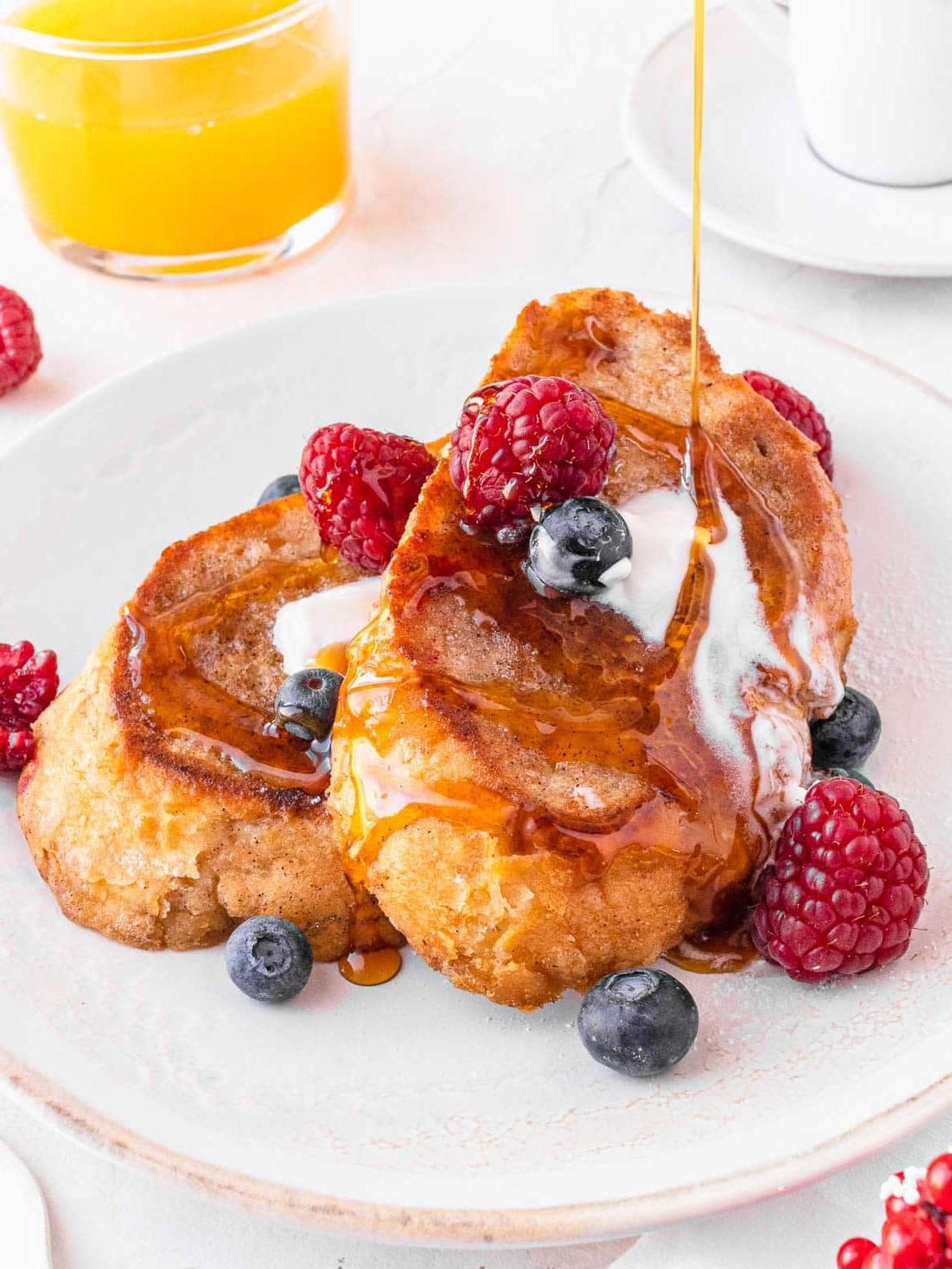 vegan French toast with berries and syrup drizzle