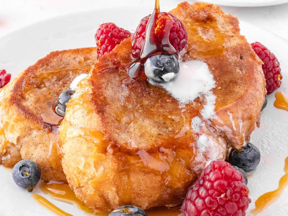 Vegan French toast with berries and maple syrup