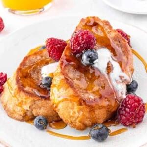 Vegan French toast with berries and maple syrup