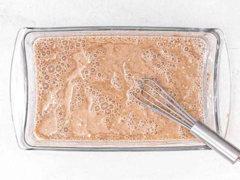 vegan batter in a casserole for French toast with a whisk