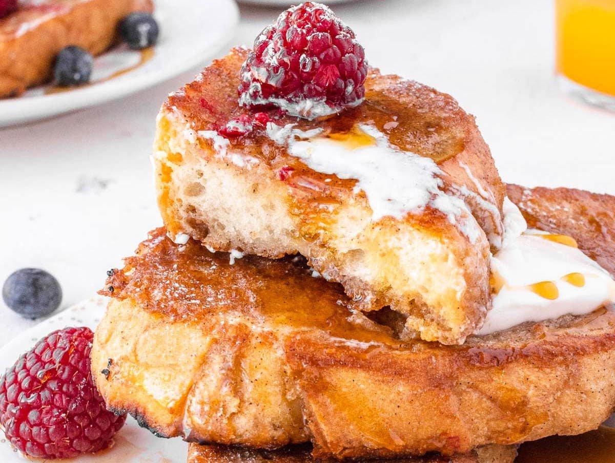 Vegan French toast with raspberries and maple syrup