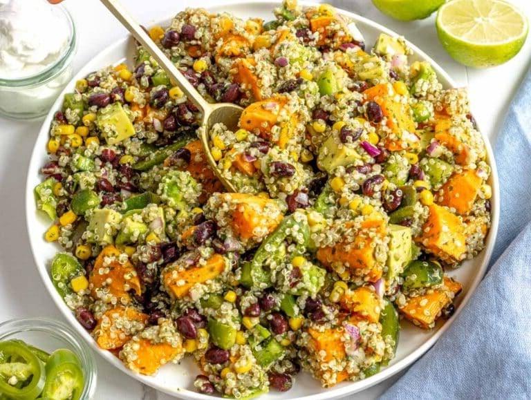 black bean salad with quinoa and a white plate