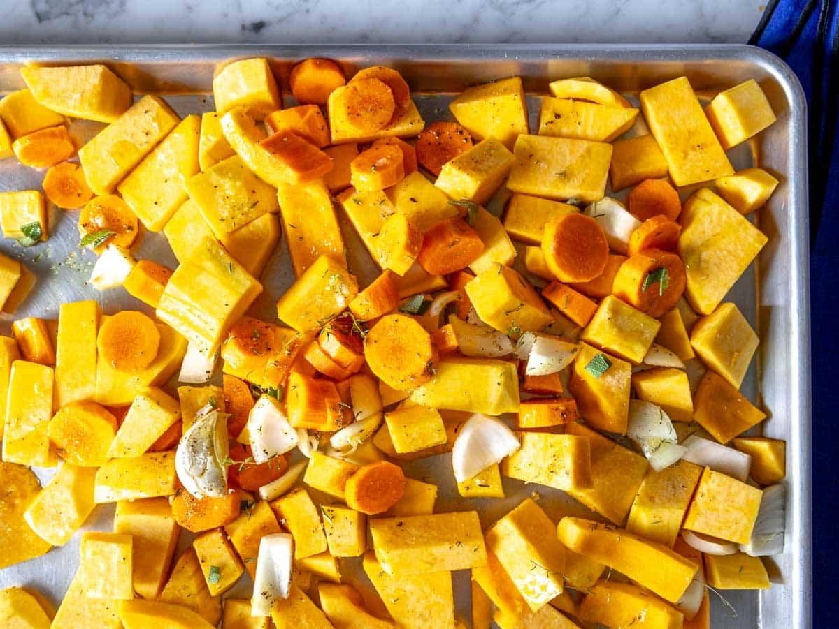 chopped vegetables on a baking tray 