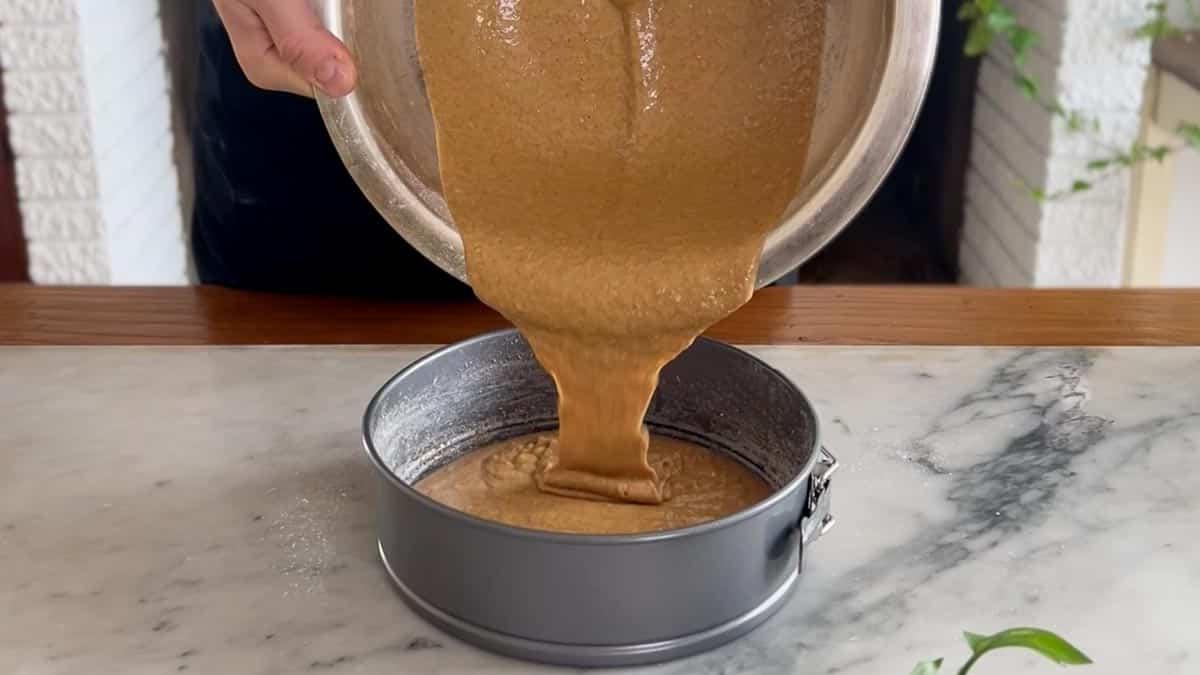 transferring cake batter into springform pan
