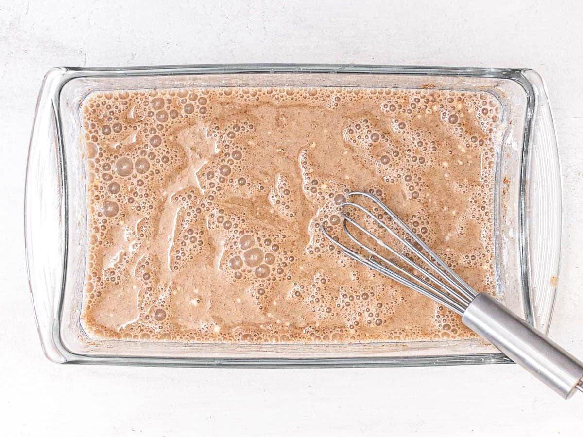 vegan batter in a casserole for French toast with a whisk