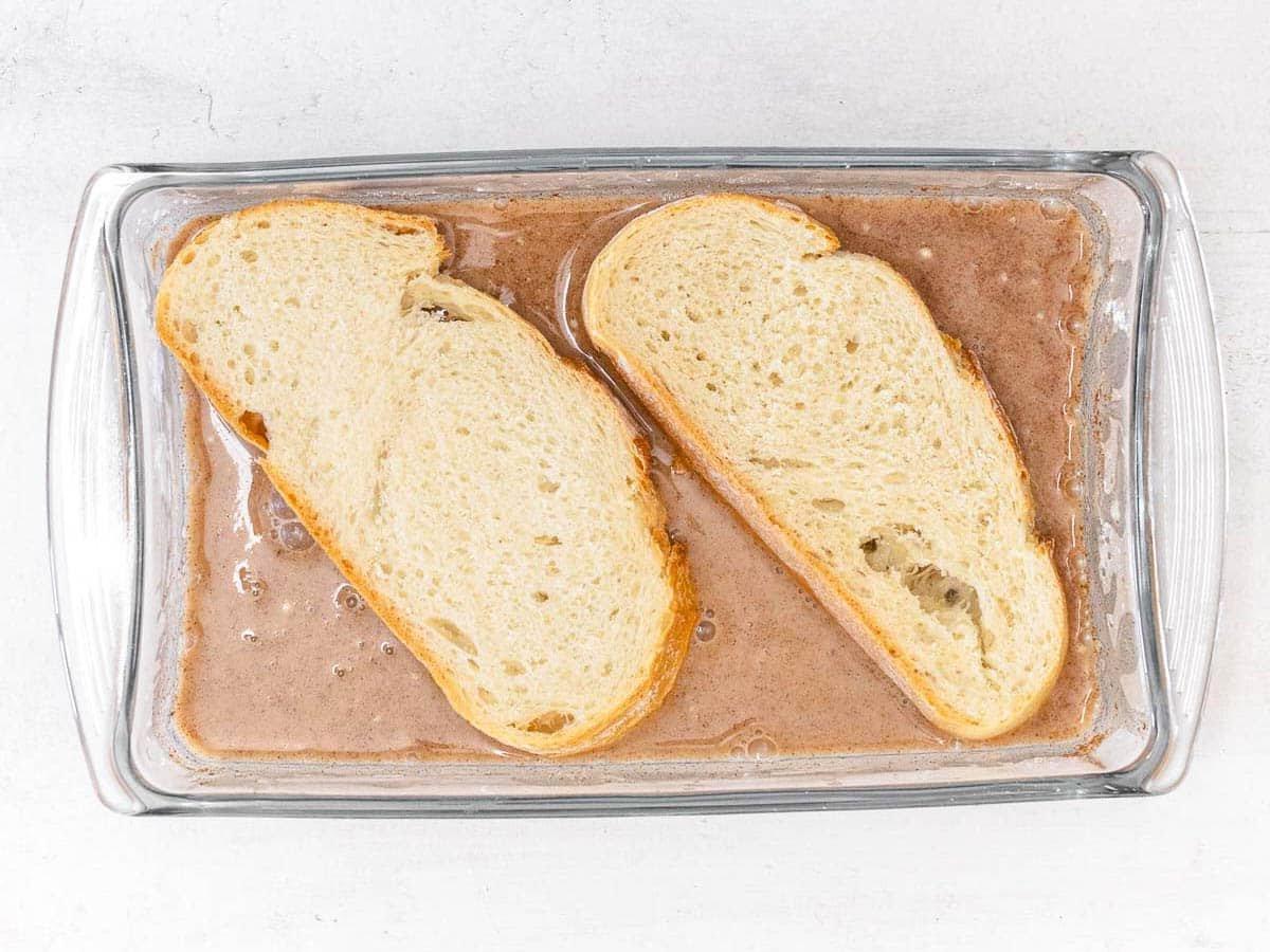 slices of bread soaking in a batter